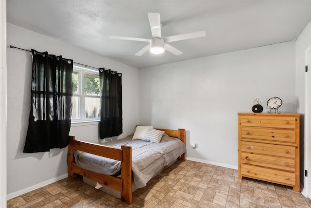 bedroom featuring ceiling fan