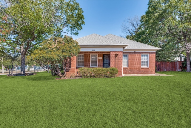 view of front facade with a front lawn