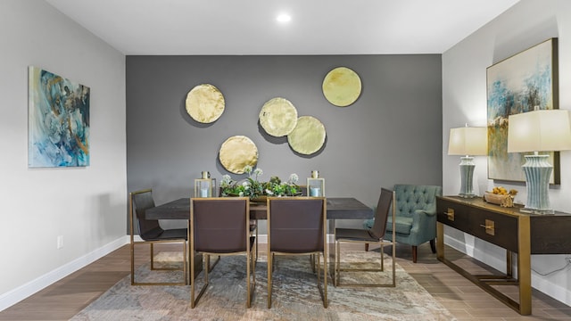 dining area featuring hardwood / wood-style flooring