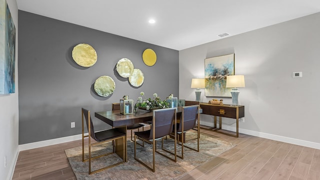 dining area featuring hardwood / wood-style floors