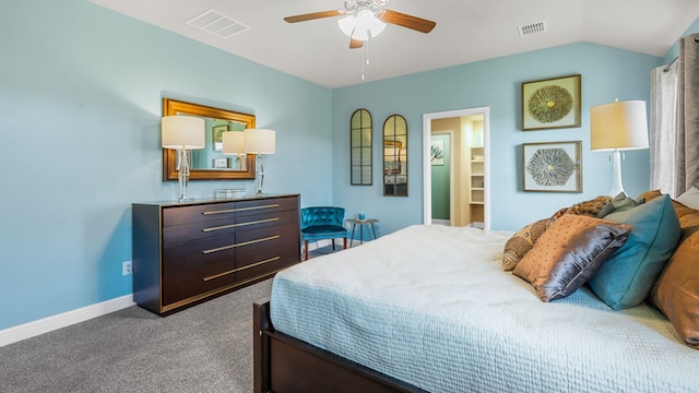 bedroom with carpet flooring, ceiling fan, and vaulted ceiling