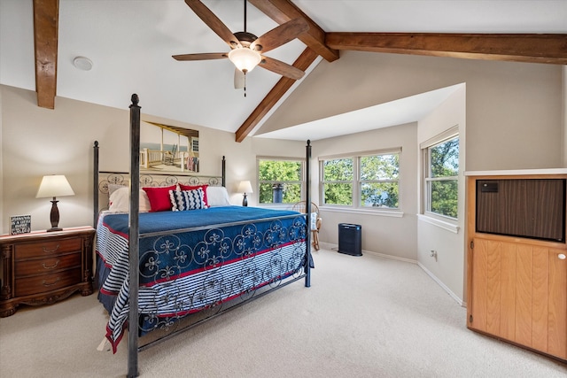 bedroom with lofted ceiling with beams, light colored carpet, and ceiling fan