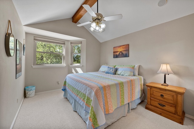 carpeted bedroom featuring ceiling fan and lofted ceiling with beams