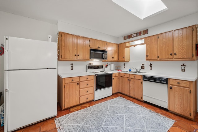 kitchen with sink and white appliances