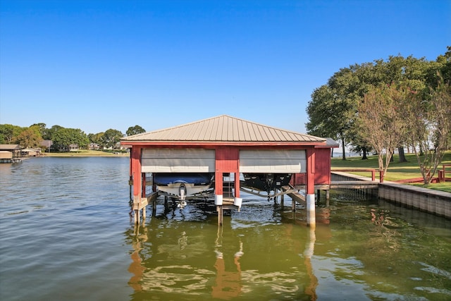 dock area featuring a water view