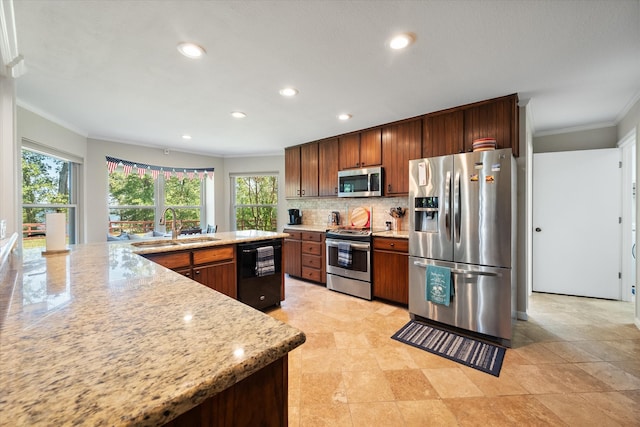 kitchen featuring light stone countertops, sink, backsplash, stainless steel appliances, and crown molding