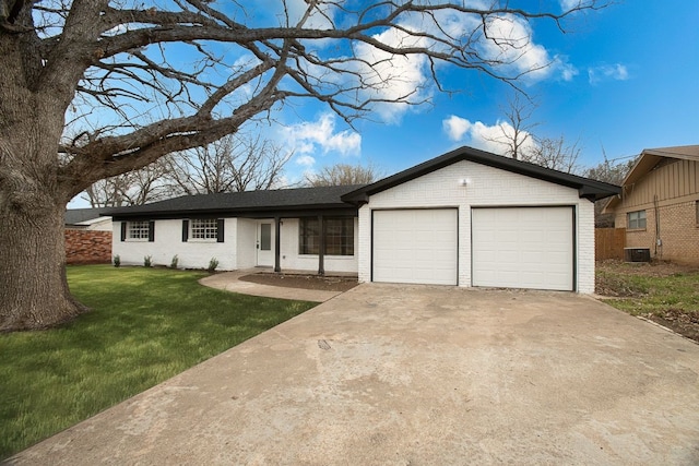 single story home featuring an attached garage, central AC, brick siding, concrete driveway, and a front lawn