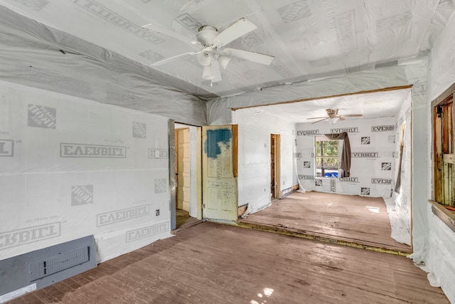 interior space with hardwood / wood-style flooring and ceiling fan