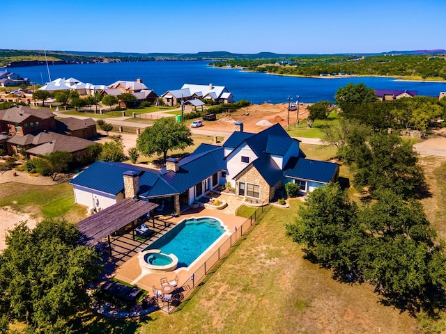 drone / aerial view with a water view