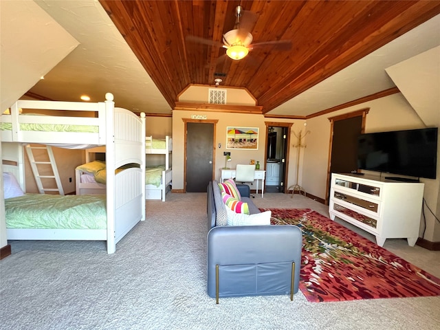 bedroom featuring carpet flooring, ceiling fan, wooden ceiling, crown molding, and lofted ceiling