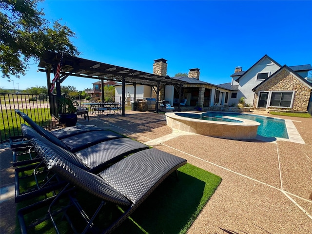 view of swimming pool with an in ground hot tub and a patio