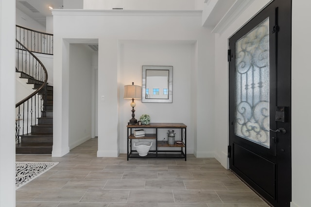 foyer with light wood-type flooring