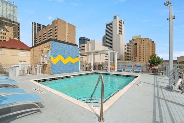 view of swimming pool featuring a patio