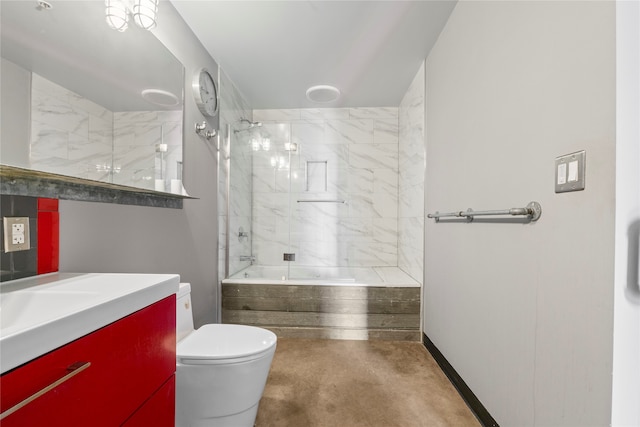 full bathroom featuring tiled shower / bath combo, vanity, and toilet