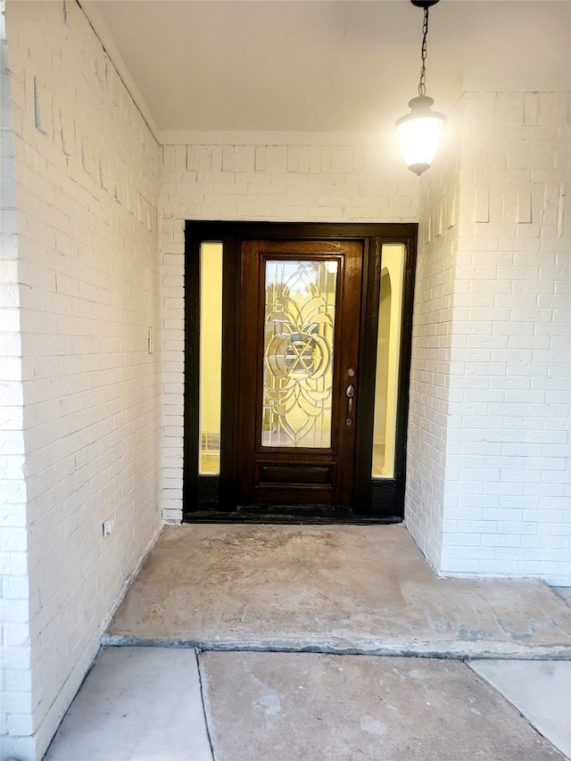 view of exterior entry featuring french doors