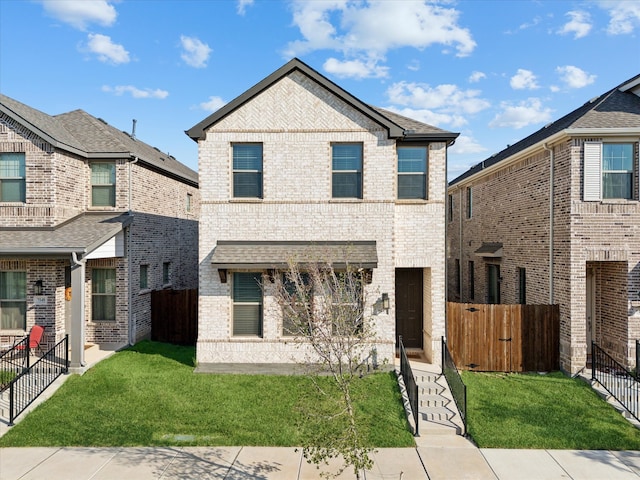 view of front of home featuring a front yard