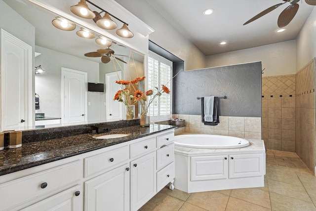 bathroom featuring vanity, tile patterned floors, independent shower and bath, and ceiling fan