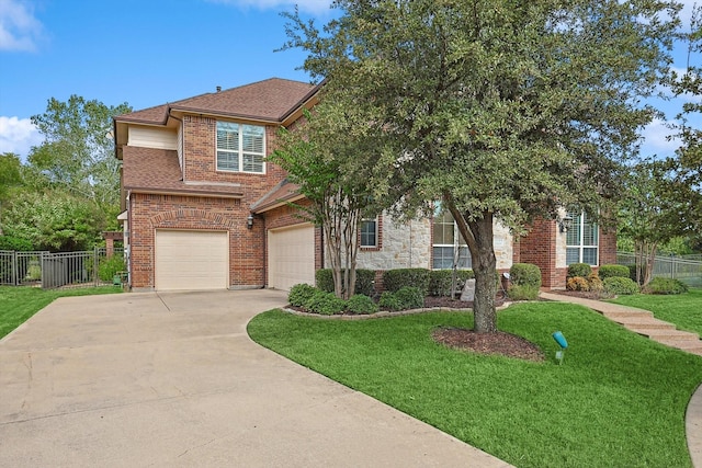 view of front of home with a garage and a front yard