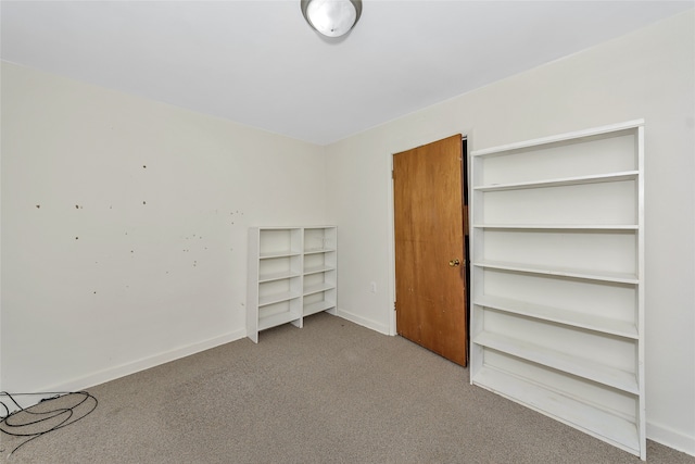 unfurnished bedroom with carpet flooring