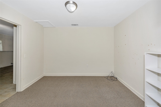 unfurnished room featuring carpet