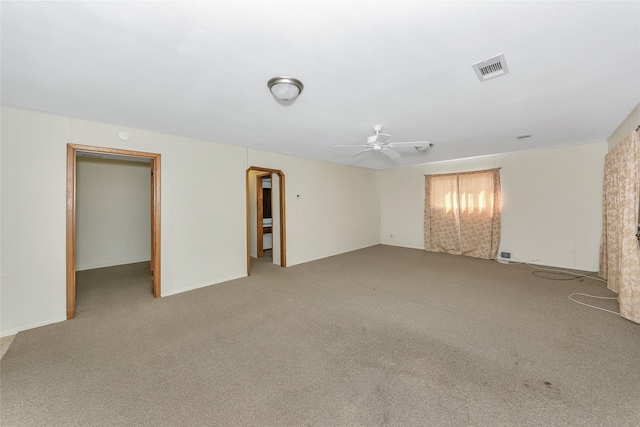 carpeted empty room with ceiling fan