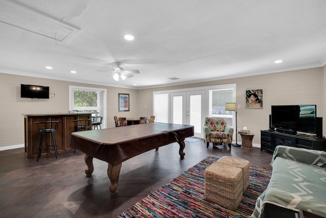 rec room with french doors, ornamental molding, and ceiling fan