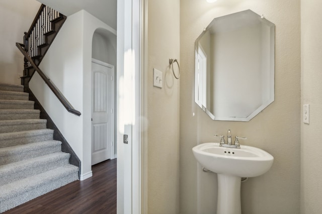 bathroom with wood-type flooring