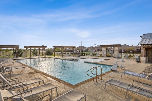 view of pool featuring a patio area and a pergola