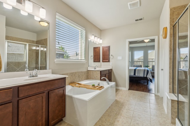 bathroom with vanity, tile patterned floors, ceiling fan, and independent shower and bath