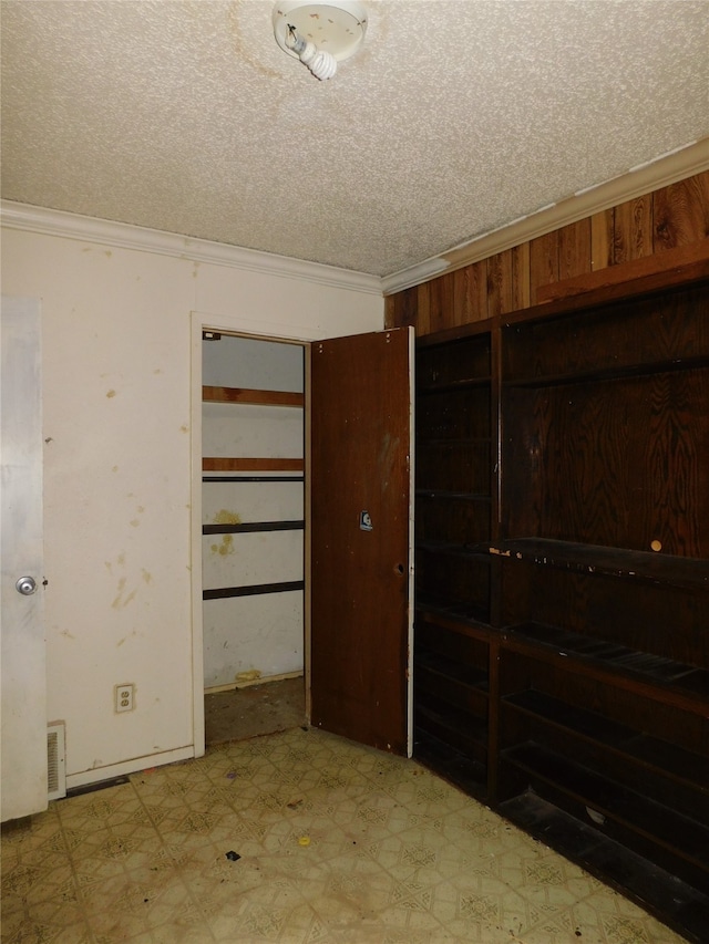 interior space with a textured ceiling