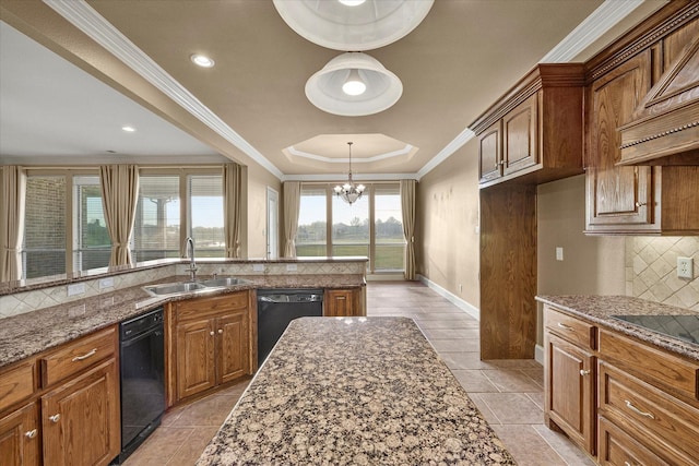 kitchen featuring sink, backsplash, a tray ceiling, ornamental molding, and black appliances