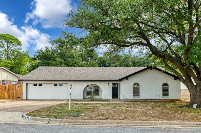 single story home with a garage