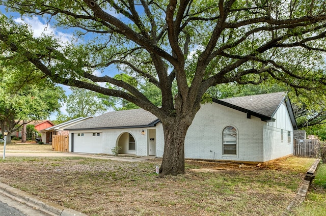 ranch-style home with a garage