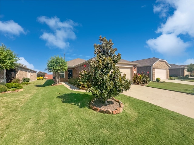 view of front of house with a front yard and a garage