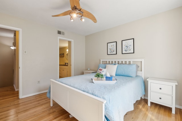 bedroom featuring ceiling fan and light hardwood / wood-style flooring