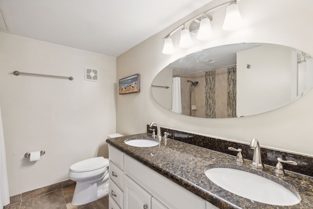 bathroom featuring vanity, tile patterned flooring, toilet, and a shower with shower curtain