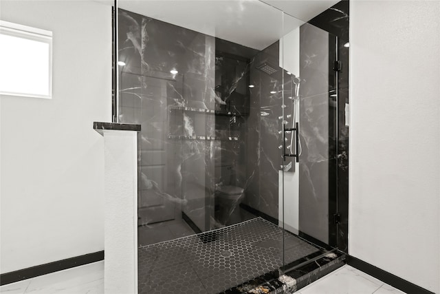 bathroom featuring walk in shower and toilet