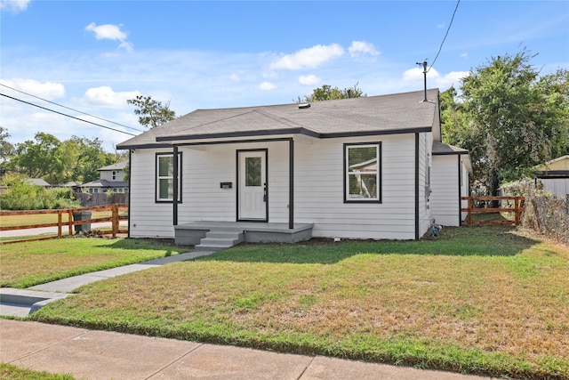 bungalow with a front yard