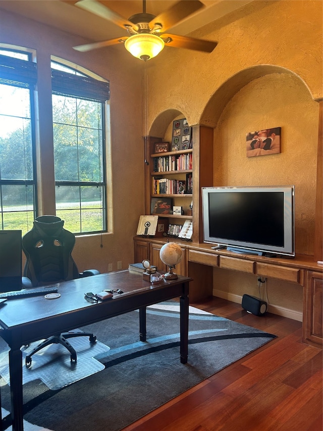 office space featuring hardwood / wood-style floors and ceiling fan