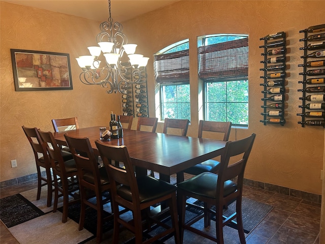 dining area with a notable chandelier