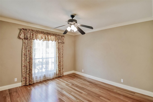 unfurnished room with light hardwood / wood-style floors, ceiling fan, and ornamental molding