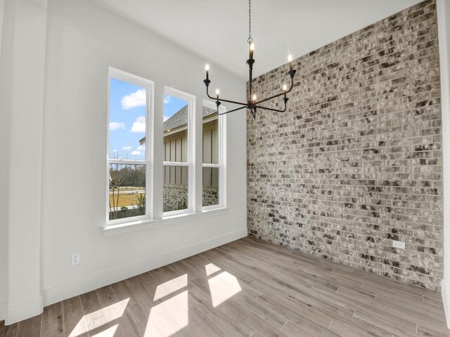 unfurnished living room with beamed ceiling, ceiling fan, high vaulted ceiling, and a fireplace