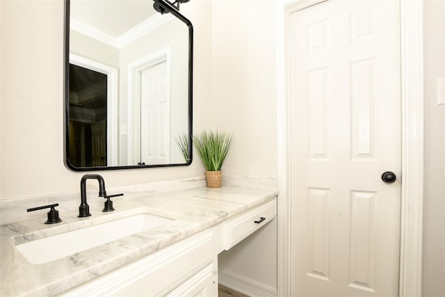 bathroom featuring vanity and crown molding