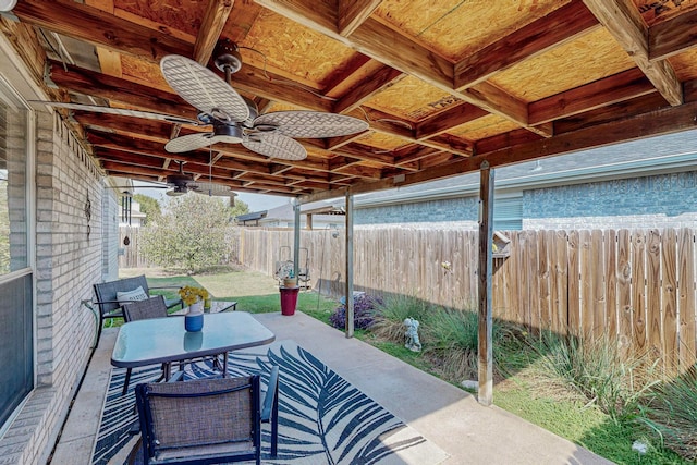 rear view of house with a lawn, a patio area, and ceiling fan