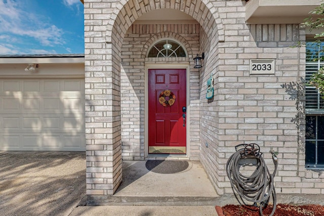 property entrance featuring a garage