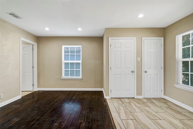 interior space featuring plenty of natural light and light hardwood / wood-style flooring