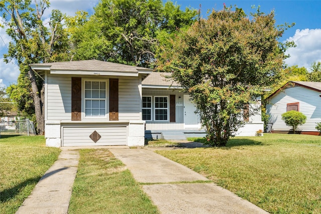 bungalow-style house featuring a front yard