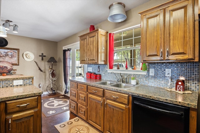 1455 County Road 2008 Unit B, Glen Rose, TX 76043 - kitchen featuring black dishwasher, a sink, and backsplash