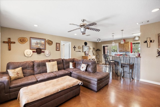 1455 County Road 2008 Unit B, Glen Rose, TX 76043 - living room with recessed lighting, finished concrete floors, baseboards, and ceiling fan