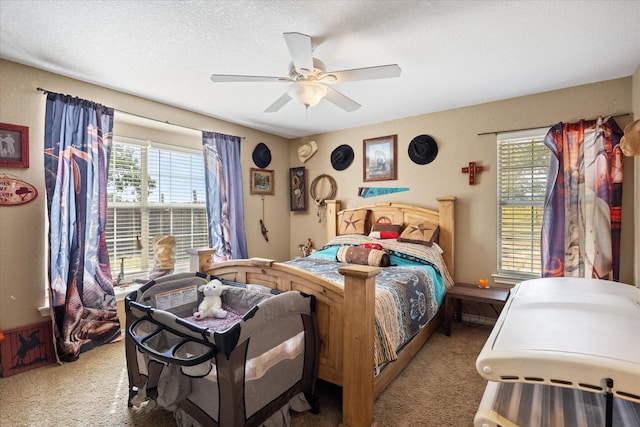 1455 County Road 2008 Unit B, Glen Rose, TX 76043 - bedroom featuring carpet floors, multiple windows, and a ceiling fan